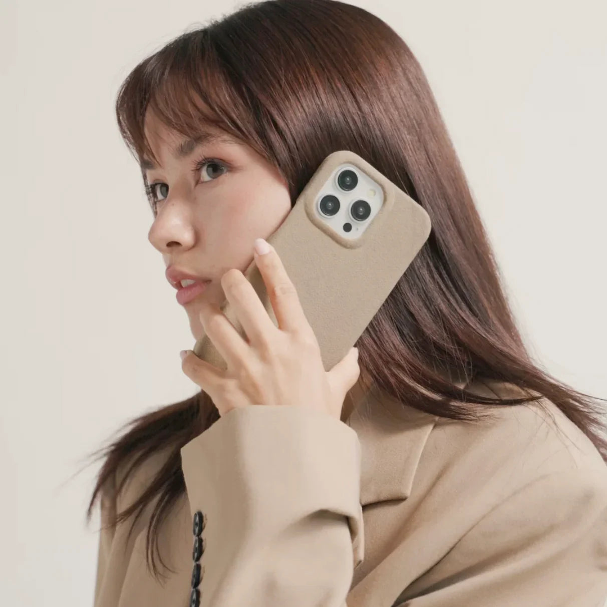 The Sport Alcantara Suede iPhone 16 Pro Max Case in Malibu Beige on White Titanium by Luriax - Lifestyle