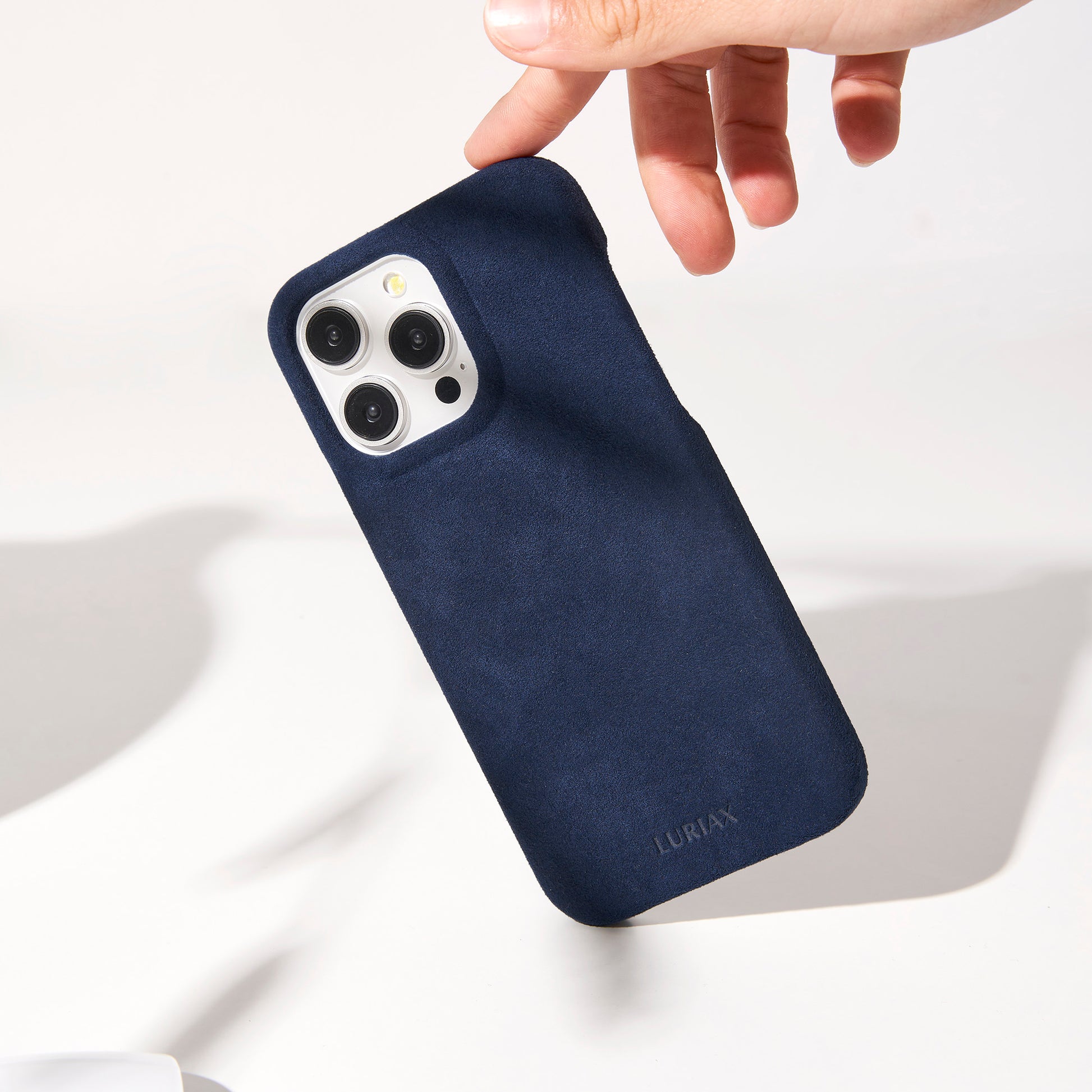The Sport Alcantara iPhone 16 Pro Max Case in Dark Blue on White Titanium by Luriax - Lifestyle